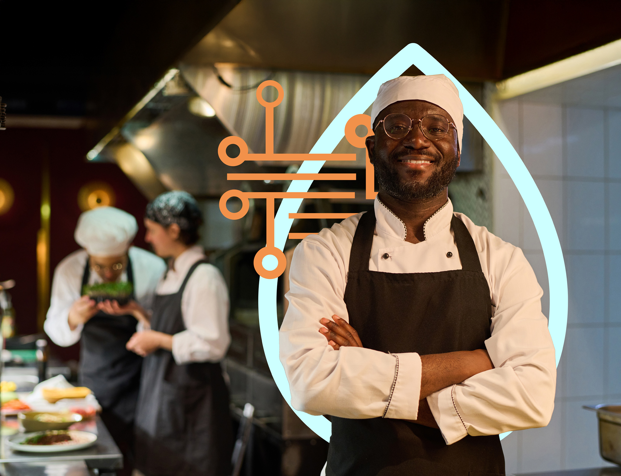 Happy African American male chef in uniform standing in front of camera in restaurant kitchen and keeping his arms crossed by chest